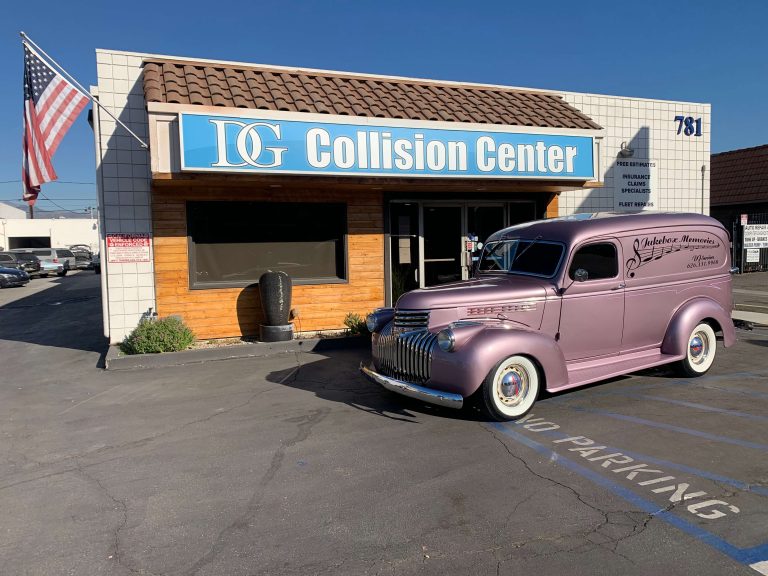 Pink vintage car repaired after collision at DG Collision Center
