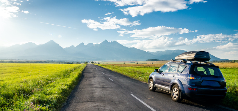 car for traveling with a mountain road. 