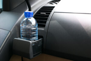 Water bottle placed on the car.