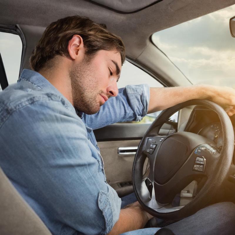 Driver falling asleep on a road trip