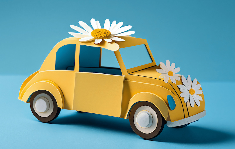 Cute yellow paper car with white spring flowers on blue background. Illustration AI