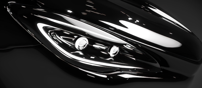 Abstract background with Illustration of a luxury sports car. the gleam of car headlights that reflect the latest technology.