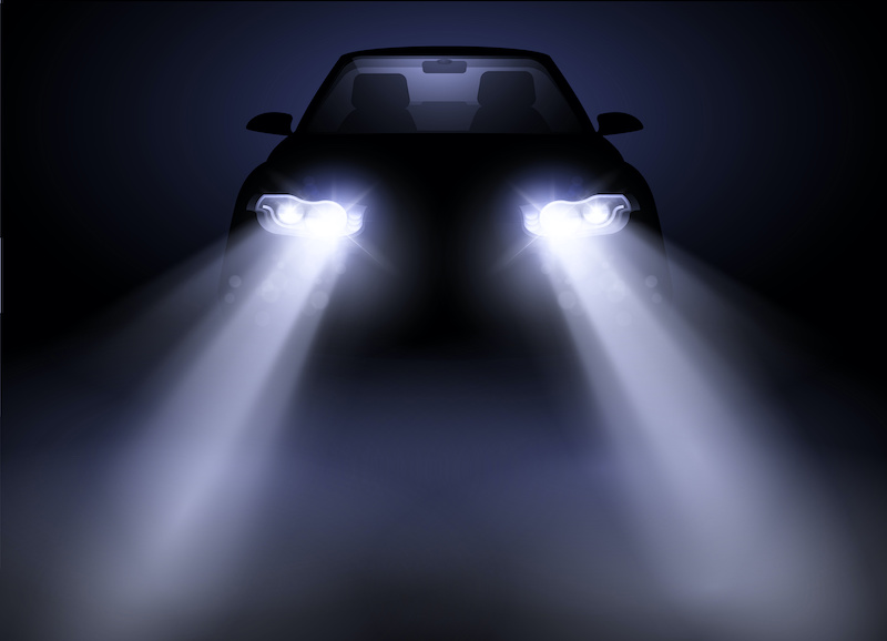 Bright and modern auto generic car headlights shining through fog at night. Vector illustration.