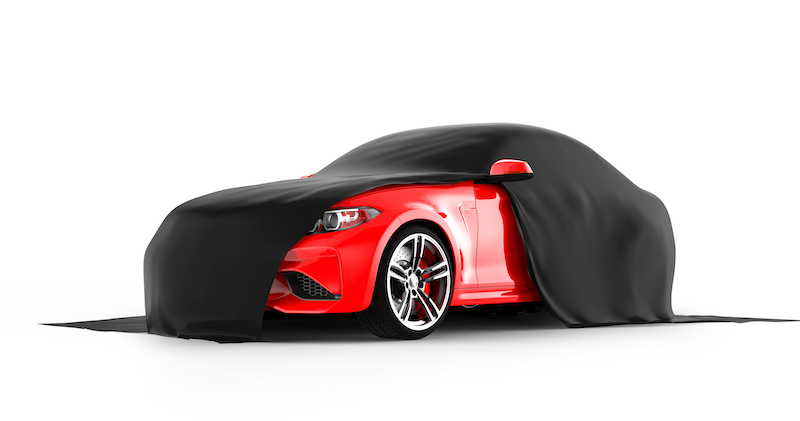 Modern red sports car with black cloth: 3D illustration