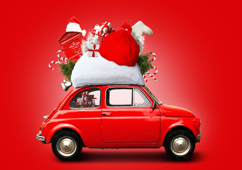 Christmas car Santa Claus with gift bag