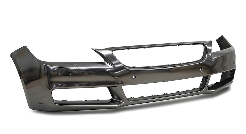 A sleek and modern vehicle bumper, designed for customization or replacement purposes. Perfect for automotive enthusiasts or businesses specializing in car parts and accessories. The bumper's metallic finish and clean lines make it ideal for showcasing styling and design options.