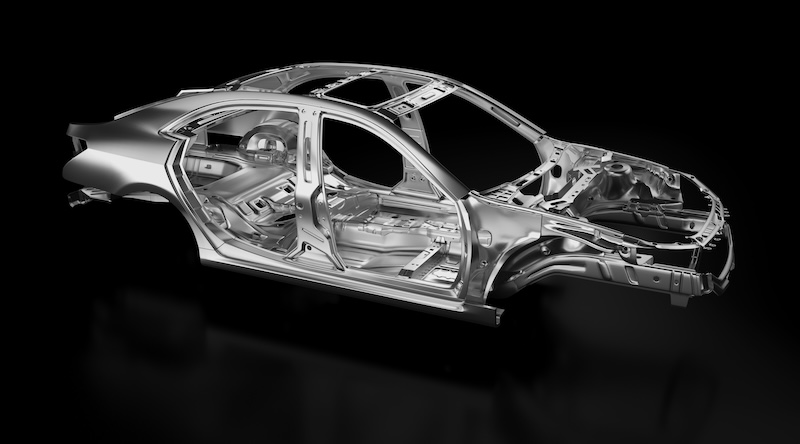Side view of production sedan car stainless steel or aluminium body and chassis frame. Metallic vehicle framing base isolated against black background with reflections. 3D rendering illustration.