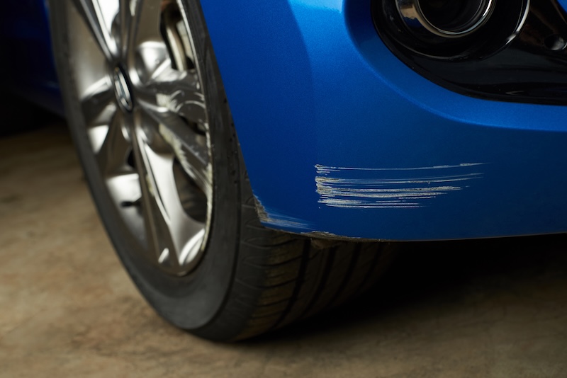 car door dent blue car lease return