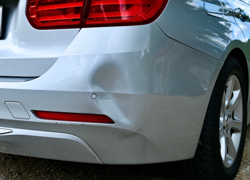 Bump on a car from a parking lot accident