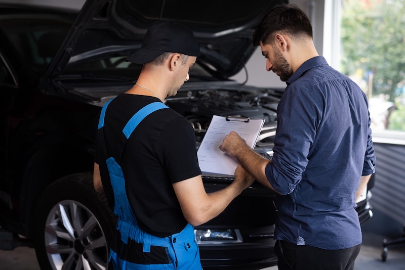 Manager Checks Data on a Tablet Computer and Explains the Breakdown to Mechanic. Car Service Employees Inspect the Bottom and Skid Plates of the Car. Specialist is Showing Info on Tablet SSUCv3H4sIAAAAAAAACnRSQW7kIBC8r5Q/WJyDhLHBdv4QaQ97i3JocHsGhYER4ERRlL8Hm/Esh92bu7q7uqrM18OvpiEKotHkqfnaqlwba9eYAiTjXYbZ4w0P6GYMNfIeOslqAGeTfDBga1BB0mcHF8ygW63d4O+9SWKCtEaM2/UbpCHhKXMU8E5RJL6UujkaezNv5Bb5E8DFqw+pCH+sJuKqtolnEzVaCw79GsnRL3f/Q/ob/dXiP8nQ/aUoH6+HYzih05+7qcpsQItQzN58kHEZOLRCUDXOA+215lRJ1lLNNLJRLrwX9+Okk90oNB/pMiwT7UfV0wmUoBzFyLtectYPu6Sig7x9JAyXOltYZ+OrWN+9BrsNdJXMazDauFO15tN5/+/HmvarS2HzR3g73fVZ76+gclpPzZJp8cDPEGPemA+8uqXzQ/OX6pTzaQ+IFFYy59ewlW3XMcmlHEXLWi6nid0Gygs6m8yzKzqIcq3fzFy7N5sCgotUg+YLRaVyijhMVAngtMURNWtFNwDPKX7/AAAA//8DAPvFU14cAwAA