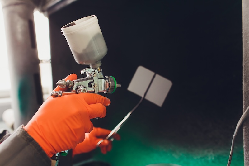 Car repair service. Worker painter checking color matching before painting. spraying black liquid onto the fitting plate SSUCv3H4sIAAAAAAAEAJ1Sy27DIBC8V+o/RJwTyTYQ2/2PnqIeeCVGISYy0KqK/O9dY5PS9Kne2NnH7Oxwub9brRBnTgv0sLpMEcTamOD8wLy2PcDFesEH1Us15IiS2ttBM5ODnHnR9eykAOyDMRM8xiRynvnglMvIuD44b8Xx3FlvAcdpjOuC92qIyQnPxgjm1QF4Pw5aVOzmeJUSMQkdkEJonWEu8IglaFz/u3N+PKXV2UH14nXabcy2HpRRbBa/m0vR8QUUnqKKpYgFqW2m6tkKZtyN/vOghe4PWZv1XXQmtQkbej9MK6Cypml5ZKw9M24mZ/YwViW8Y85Bh0x4fmv4CvaUUfXWRw3LSZAEMyIPLtumKHFR4HJLa9IQlEwHB7X8yXRUtSUhRUUq9I396LGk5RbDdNKiTz+q01AX5SaGcDaWSSXfoS9oS0oxxYTQ+uruLe9SQutqrhiv+wV+0lD5F4aG4N8YmqZoF4ZMnZ6mI1HhphJEbfaFFBtSU77h+2I7vepGiJZVvIGbjG9UqeBHzgMAAA==