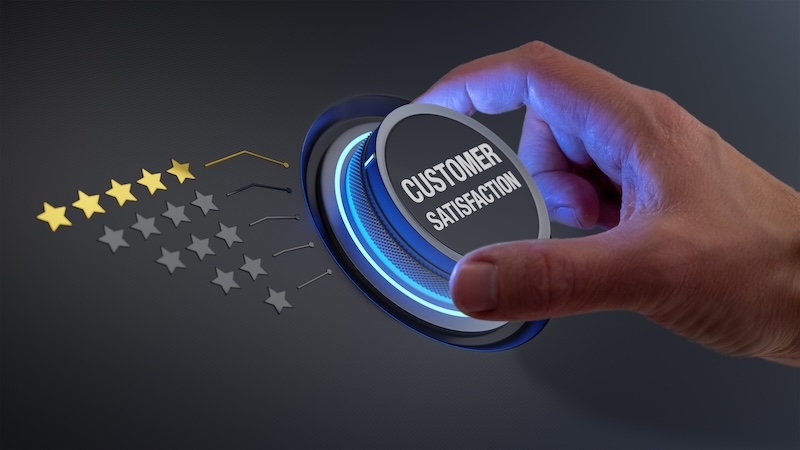 Five star customer satisfaction rating review praising excellent reputation and quality of service or product. Concept with manager hand turning knob to select highest performance evaluation ranking