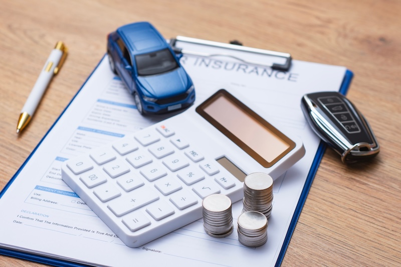 Car insurance document on clipboard with white calculator, stacked coins, blue toy car and modern car key on wooden desk. Concept auto insurance premium calculation and vehicle finance planning SSUCv3H4sIAAAAAAAACpxSSW7DMAy8F+gfDJ1rQK6dWu5Xgh5oWY6FKpKhJUUQ5O/VYgcMeutNHA6HHFK315eqIiM4yclndUtRjKVSwXkLXhodYfq24VboSViMXGz7QTEAEkdikt5YCQqDI3i+aDiLCOqgVILvOUmcBx+ccGgWtwTvhXXe8O8IN4jNwYtTlH/i716OJa72RE7GipgiZBulNAhjxnaoiP+rsjy+Hrs4Cc2vabY7mtoKJaB4PBYq+f6JDs/ZxUaCMEmDXF0MB5UILVICuYKFp7rVSi71CSHGL/lkuxI3QXt7xWaIMmaFUaWDzLGN2PEFnIv0acfx7uMHMWfURxufPW2qZIrHSWHTds3QDW3TD7SnXcfYRii3XmTUyePsA4ZVGZhEavo4wJ9f0PcH2gyHfigMvN/MkRPeikxiZGDAYKS8hve5r7tm5DWb6aFmQ9sz1vKZ0Sbe8v4LAAD//wMA05cmrRQDAAA=